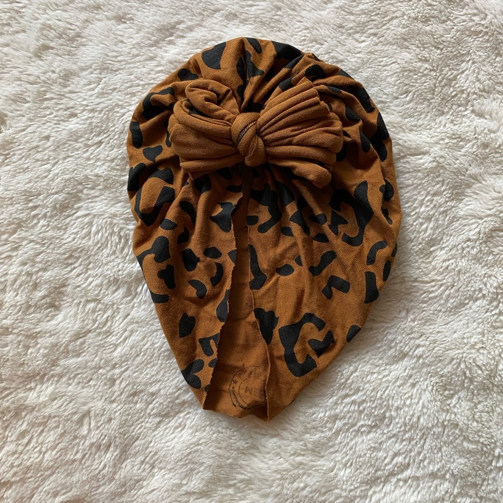 Kyte BABY bunny knot. Size: 0-3 months. Color: big leopard raga style